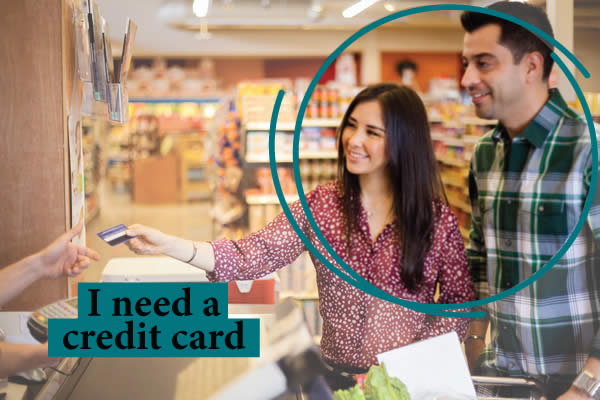 Couple using credit card